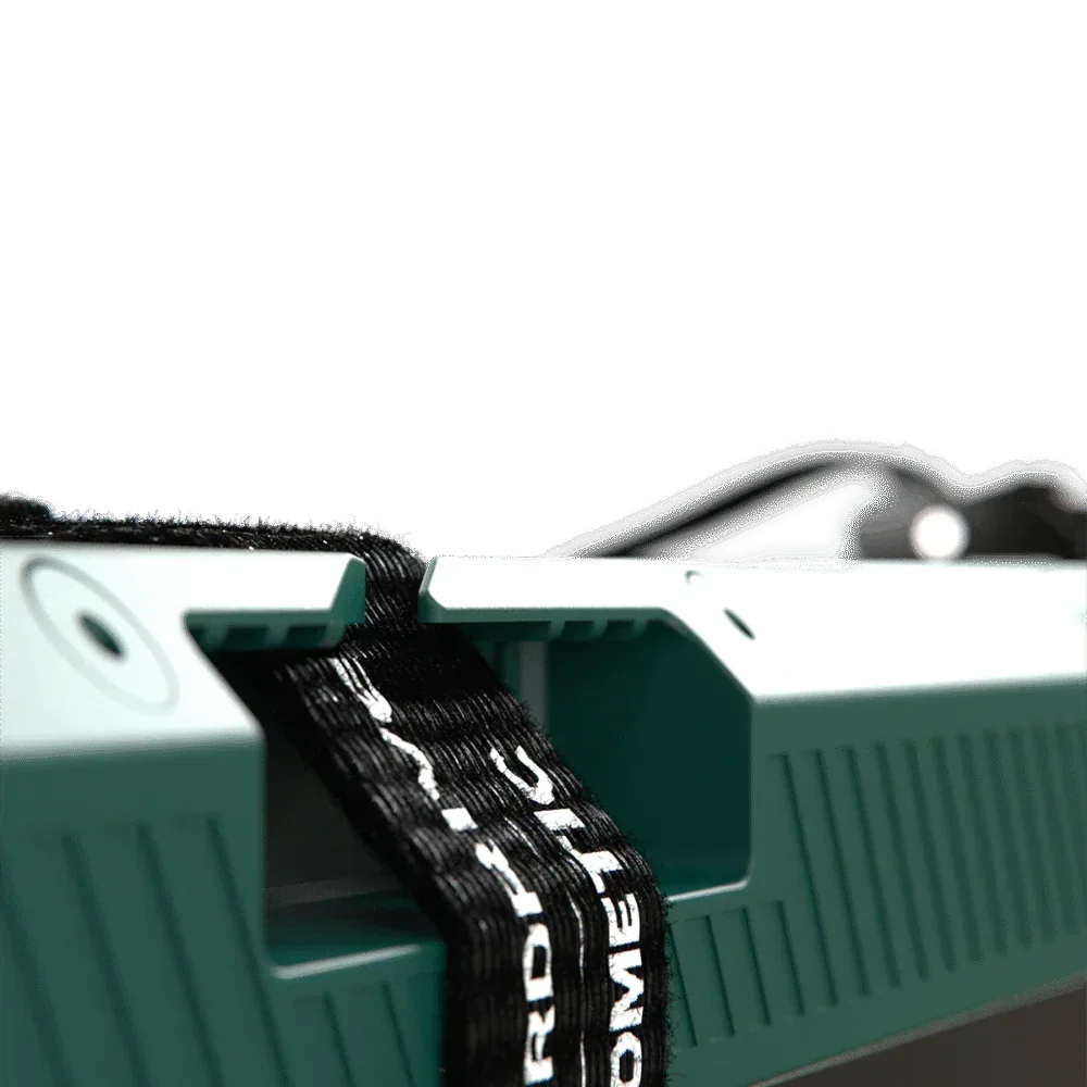 Close-up of Off-Grid 12V vehicle accessory with rugged handle and black securing strap