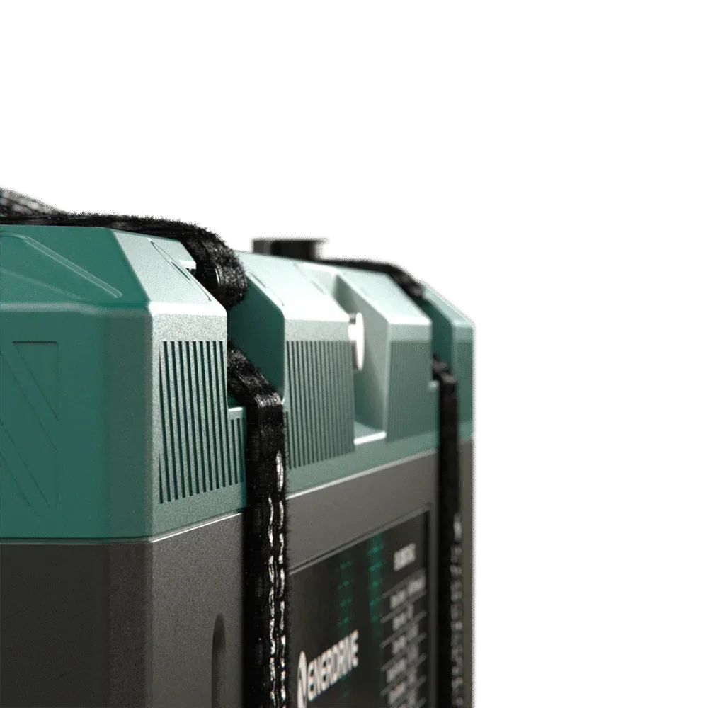 Close-up of a premium off-grid 12V battery with green casing and carrying strap.