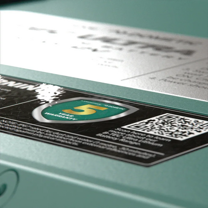Close-up of a 12V off-grid accessory warranty label with QR code and 5-year guarantee.