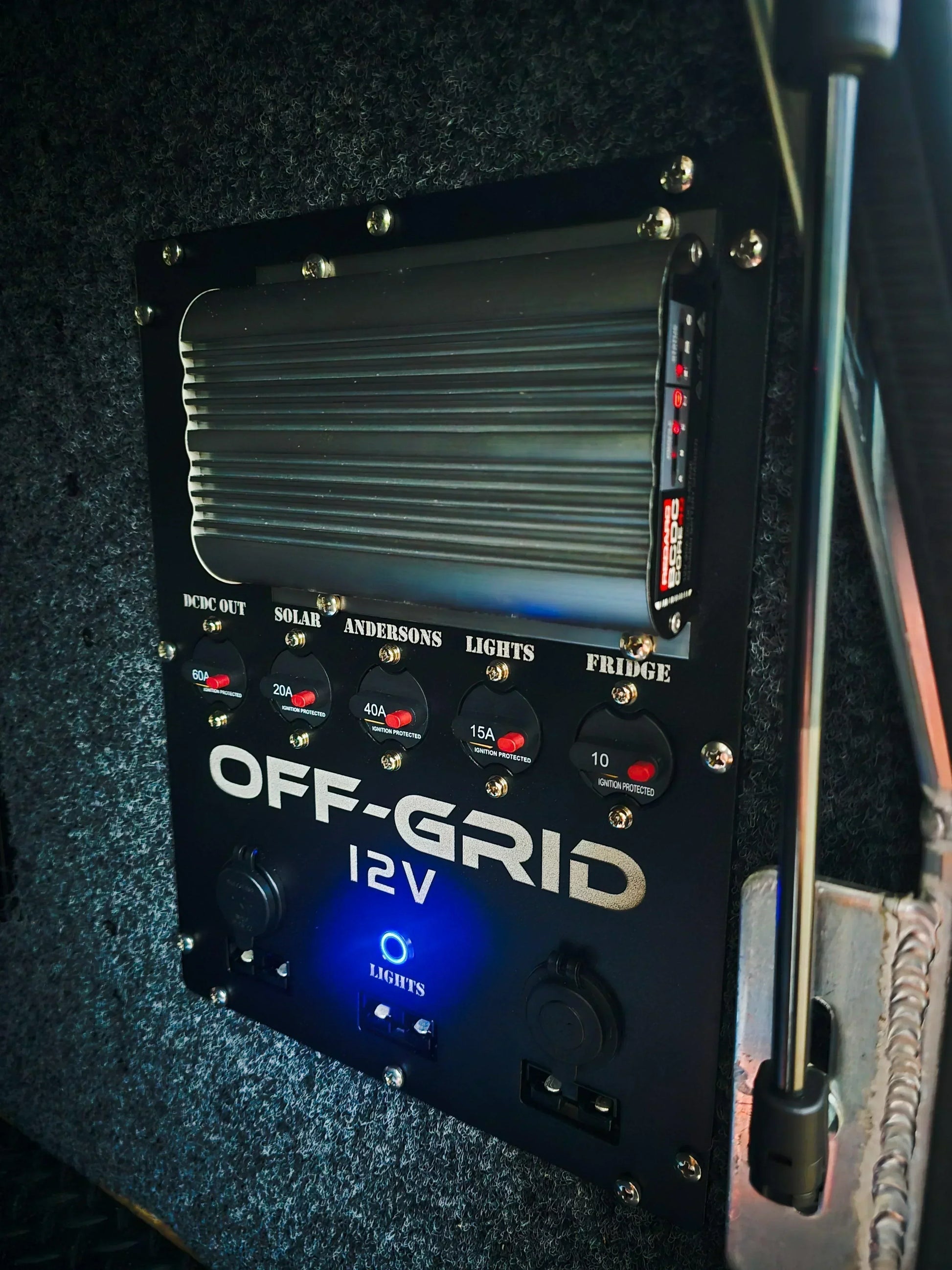 Off-Grid 12V power control panel with illuminated switches for vehicle accessories